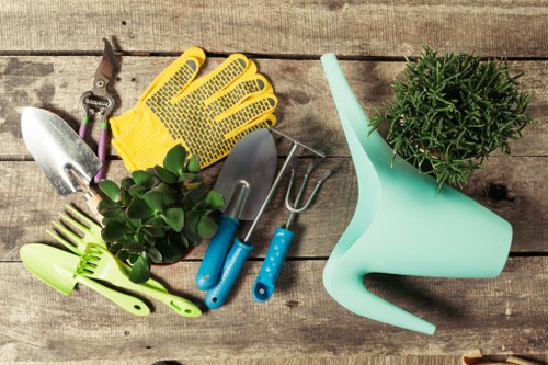 Garden maintenance work in Aldborough Hatch with tidy lawn and borders