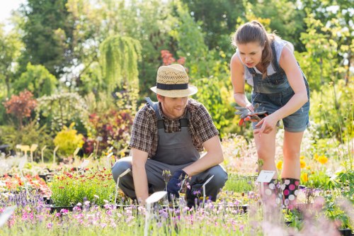 Gardeners Aldborough Hatch team working in a well-kept garden